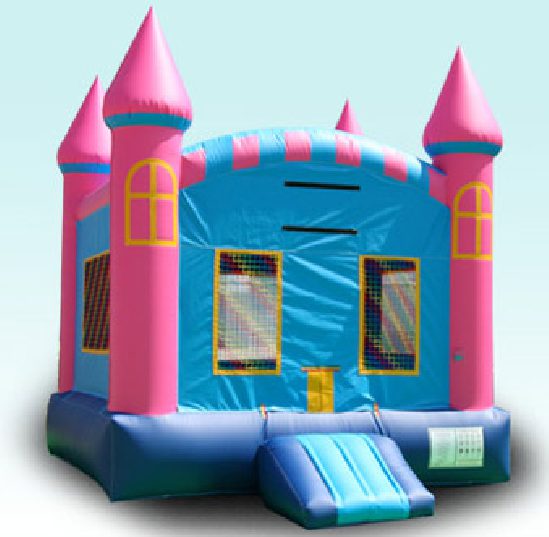 A pink and blue castle bounce house with slide.