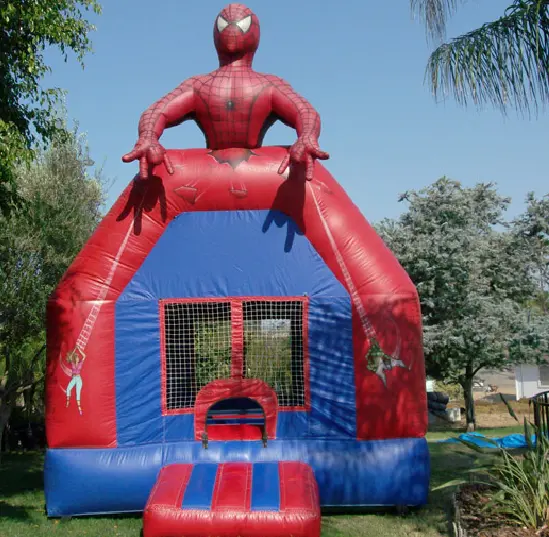 A red and blue inflatable spider man bouncer.