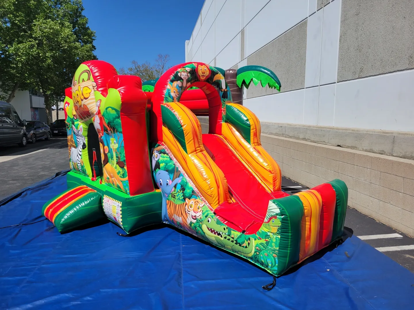 A large inflatable slide with a bunch of obstacles