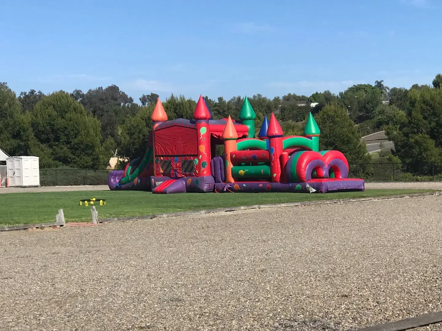 A large inflatable castle with many colors.